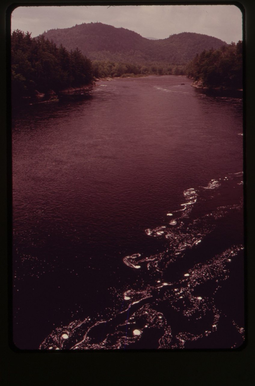 LOOKING ALONG THE ANDROSCOGGIN RIVER FROM THE BRIDGE AT
