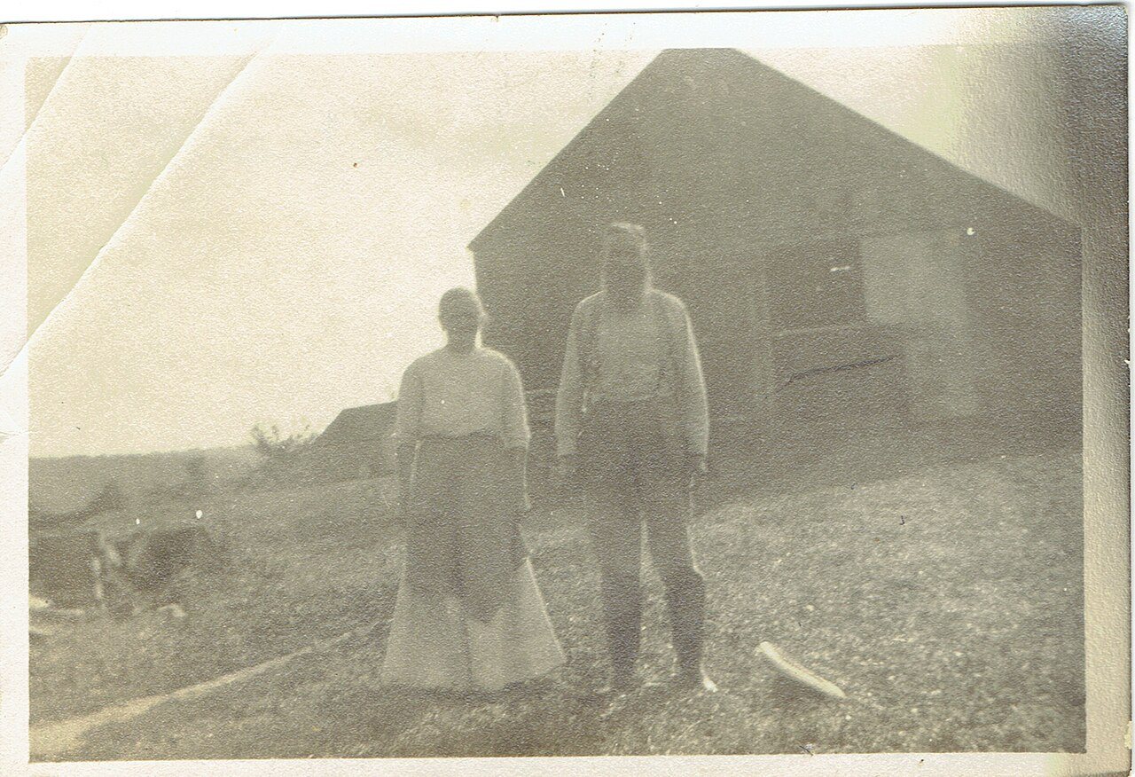 Emma Shea & David Jewett by their barn