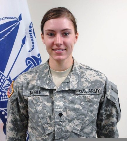 U.S. Army Spc. Cori Noble, a medic assigned to the 4224th U.S. Army Hospital, poses for a photo in Pinellas Park, Fla.,…