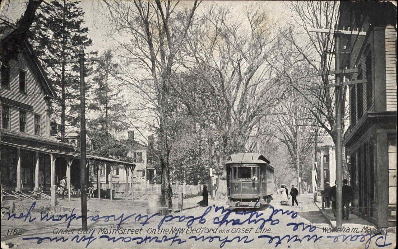 Postcard of streetcar on Main Street
