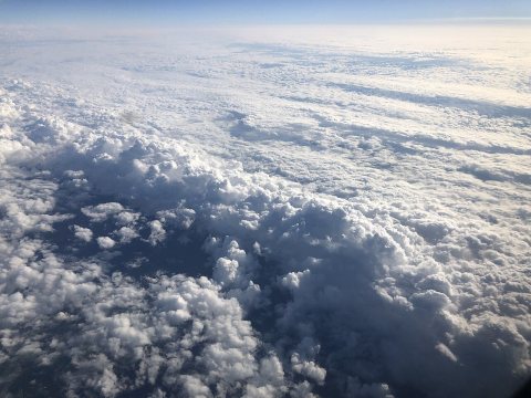 2022-09-11 17 13 47 Aerial view of towering cumulus clouds embedded in a larger shield of stratus over Berrien Township…