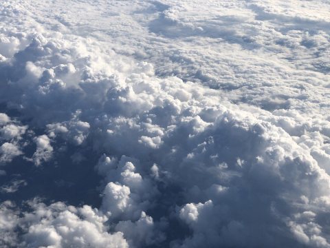 2022-09-11 17 13 40 Aerial view of towering cumulus clouds embedded in a larger shield of stratus over Berrien Township…