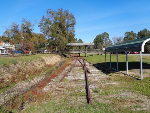 End of the rail line and pedestrian bridge to Uvalda Park