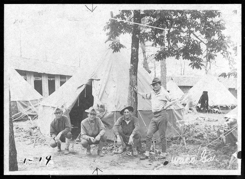 Photograph of Courtney Hodges and infantry encampment