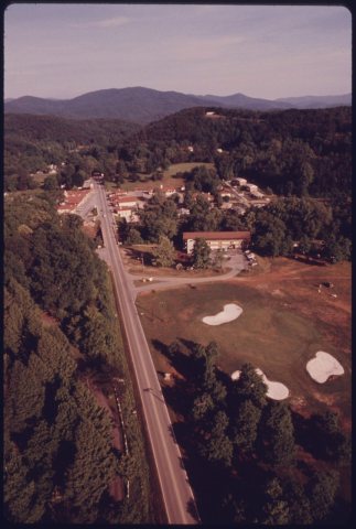 AERIAL VIEW OF HELEN, GEORGIA, NEAR ROBERTSTOWN, SHOWING GEORGIA HIGHWAY 17/75 LEADING INTO TOWN FROM THE SOUTH