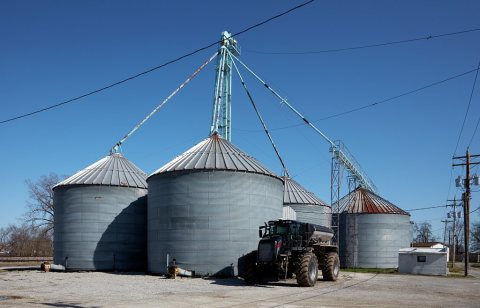 A cluster of metal grain silos near Clark, Missouri