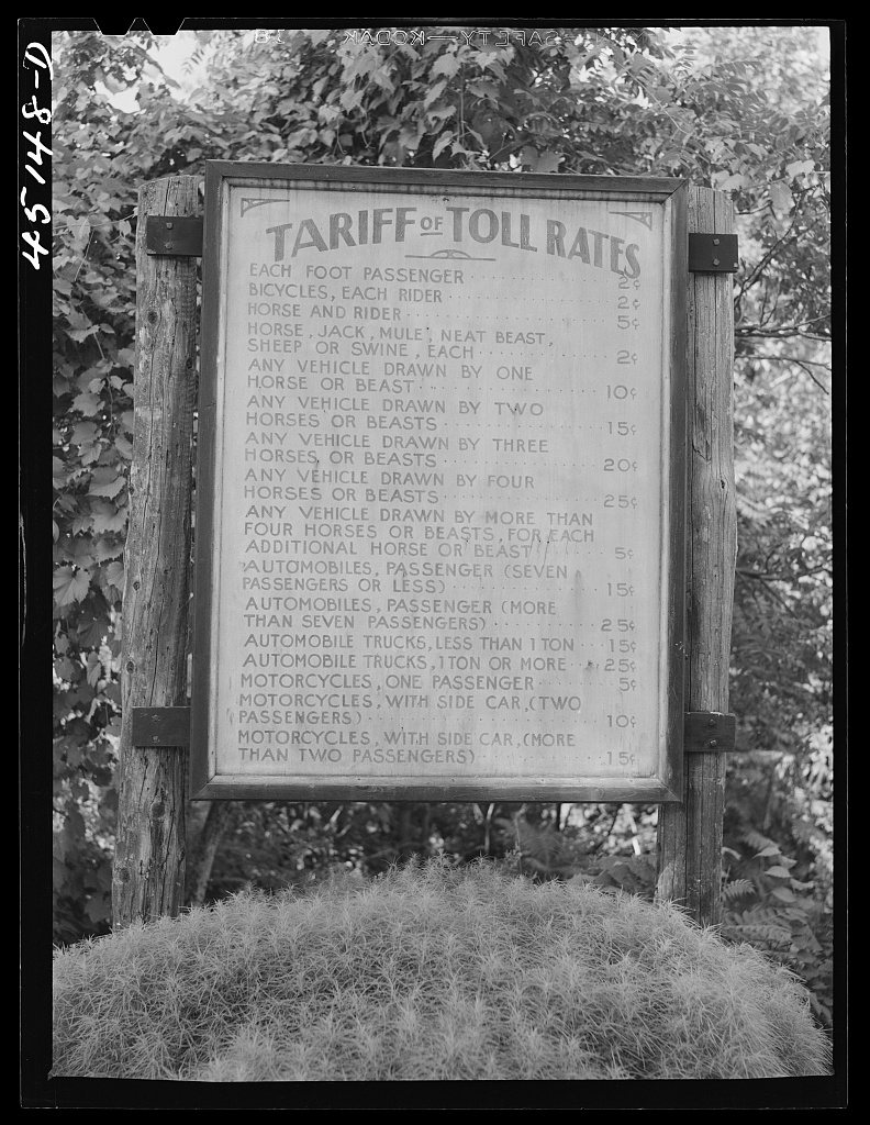 Toll rate sign on the New Hampshire side of a bridge across the Connecticut River near Springfield, Vermont