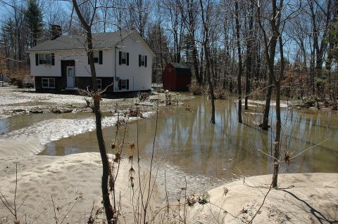 FEMA - 29441 - A home surrounded by flood water taken on 04-19-2007 in New Hampshire