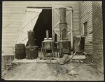 Prohibition Moonshine still disconnected. When assembled still was a[s] high as 2 story house. Raided by state police a…