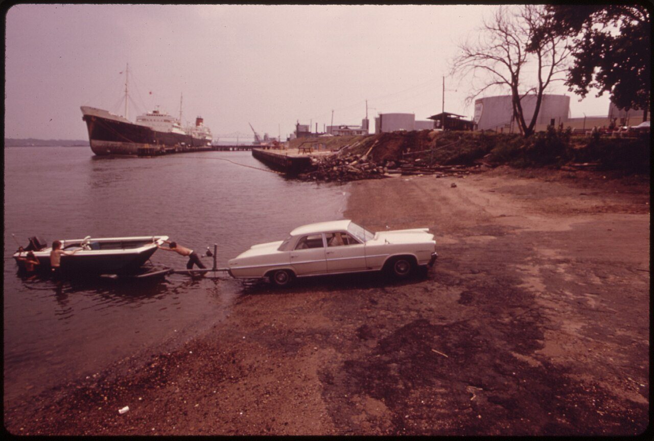 AT SEWAREN BEACH SOUTH OF CARTARET, A CONCRETE RAMP HAS BEEN BUILT TO FACILITATE PRIVATE BOAT LAUNCHING. IN... - NARA -…