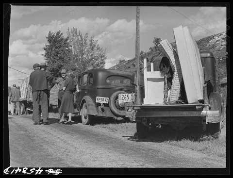 Townsfolk at an auction in the Pine Camp expansion area on the Ingalls farm near Antwerp, New York