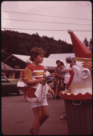 CLOWN-TOPPED GARBAGE CAN IS USED AT AN ICE CREAM STAND IN INLET, TO ENCOURAGE ITS USE AND CUT DOWN ON LITTER, IN THE...…