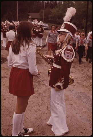 CHEERLEADER CHATS WITH HIGH SCHOOL BAND LEADER BEFORE MEMORIAL DAY PARADE AT THE LITTLE TOWN OF INLET NEAR THE FULTON C…