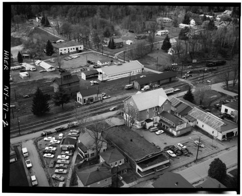 Aerial view of station and freight house (in center, on the track side), taken April 1971 - Erie Railway, Hancock Stati…