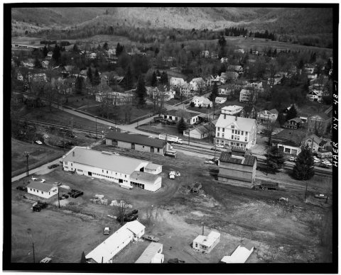 Aerial view of freight house (long one-story building with a gable roof, on the track side), taken April 1971 - Erie Ra…