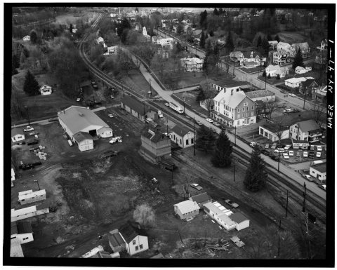 Aerial view of station and freight house (in center, on the track side), taken April 1971 - Erie Railway, Hancock Stati…