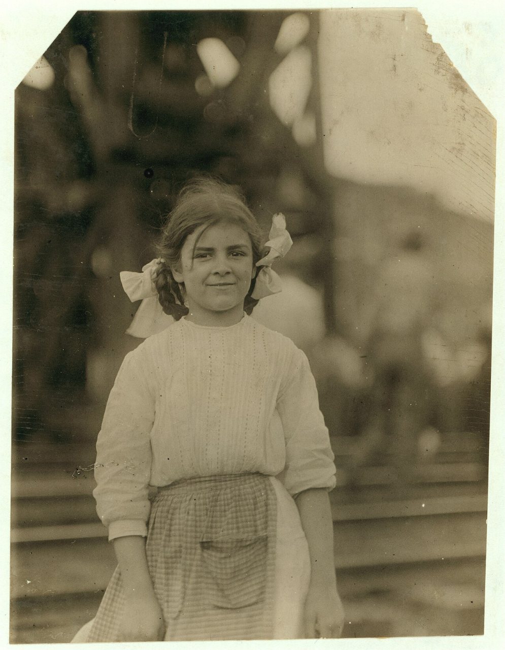A 12 year old girl who has been working in Weave room of Condolidated (i.e., Consolidated) Duck Mills, La Grange, Ga., …