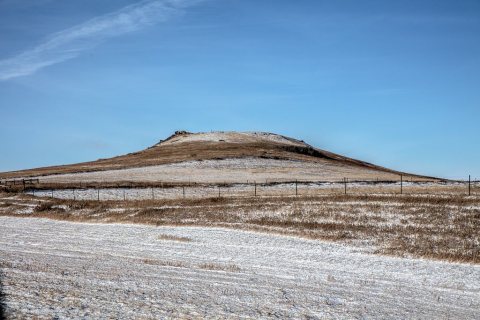 A low hill near Hebron, North Dakota, in a part of the state where the generally flat terrain begins to rise as it reac…