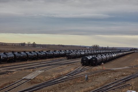 Three of many strings of oil-carrying tanker cars