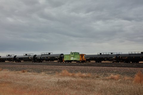 One of many strings of oil-carrying tanker cars