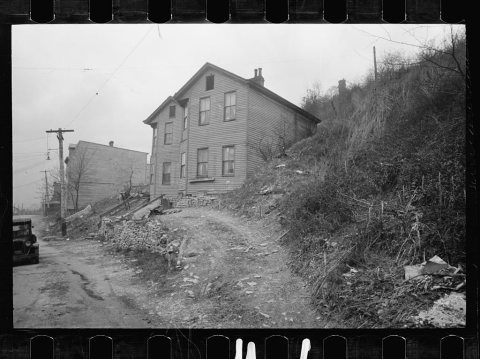 Typical frame house on hilly shore of Ohio River