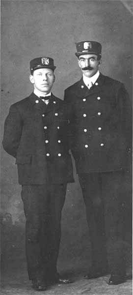 Firemen H. E. Nordquist and Bill Delaney from Wallace, Idaho, between 1900 and 1910