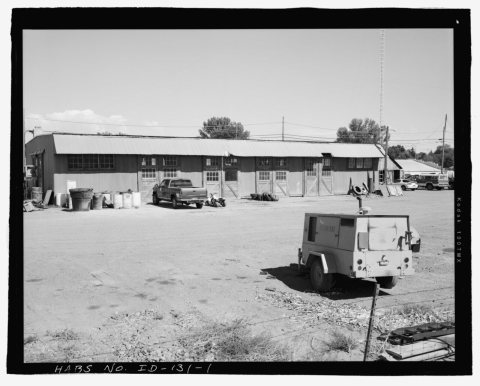 AFRD WAREHOUSE, SOUTH SIDE. FACING NORTH. METAL AWNING ALONG LENGTH OF BUILDING AND VERTICAL METAL SIDING ARE ALTERATIO…
