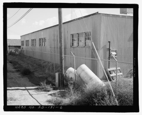AFRD WAREHOUSE, NORTH SIDE, FACING EAST. - Minidoka Relocation Center Warehouse, 111 South Fir Street