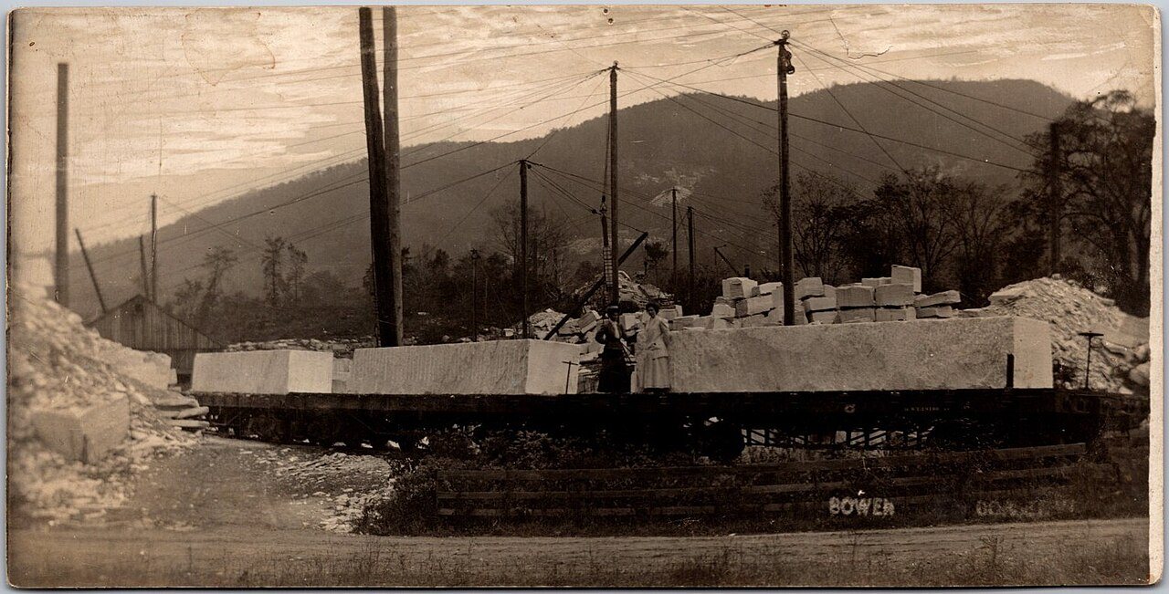 Women on rail cars in marble quarry, Dorset, Vermont - postcard