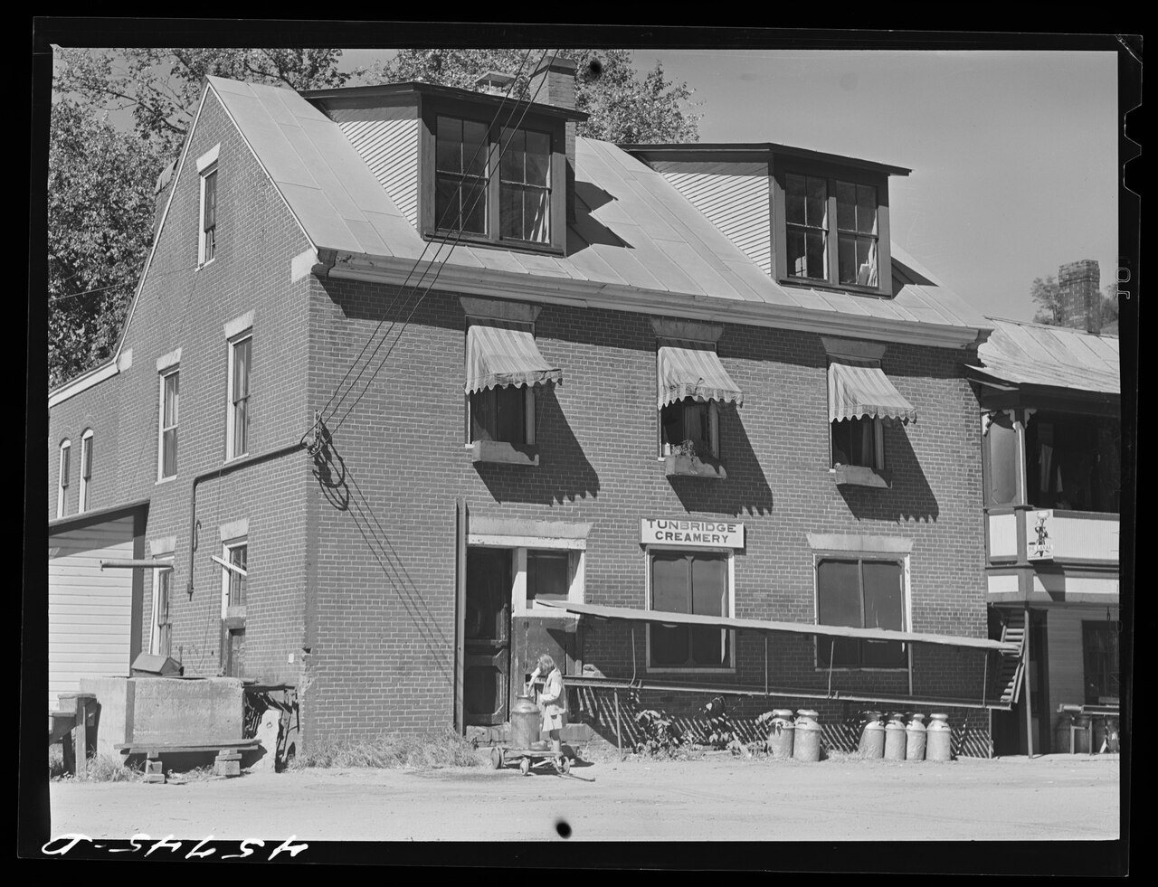 Creamery in Tunbridge, Vermont, by Jack Delano, September 1941, United States Office of War Information, from the Libra…