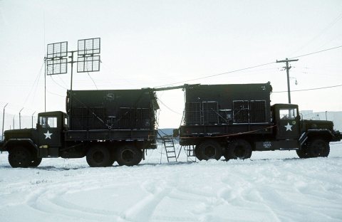 A view of two truck-mounted shelters housing MRC-69 radio terminal sets during arctic training exercise Jack Frost '77