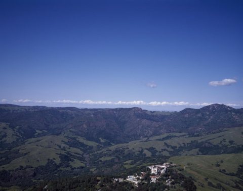 Aerial view of William Randolph Hearst's "Hearst Castle" and the surrounding central California coast terrain