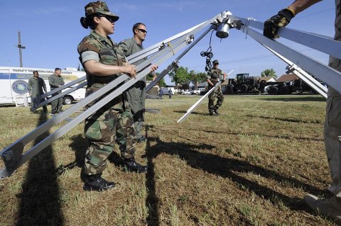 US Navy 100510-N-0775Y-017 Sailors assigned to Naval Air Station Lemoore, Calif., set up a tent to serve as an emergenc…