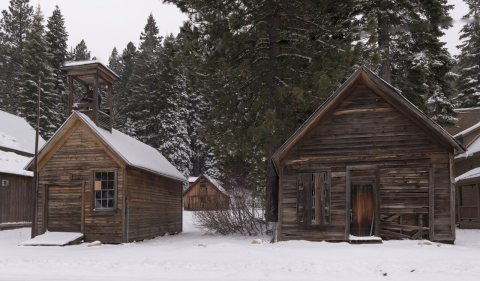 Remnants of the old mining town of Johnsville, now largely abandoned except for a few residences and the Iron Door, a p…
