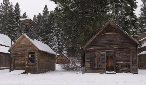 Remnants of the old mining town of Johnsville, now largely abandoned except for a few residences and the Iron Door, a p…