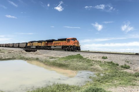 A long, passing freight train near Avondale in rural Pueblo County, Colorado