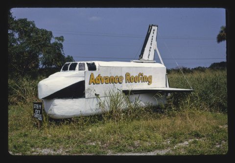 Advance Roofing Shuttle sign