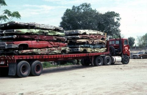 Crushed cars on truck