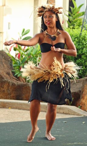 Hula dancer in action, Poipu, Kauai, Hawaii