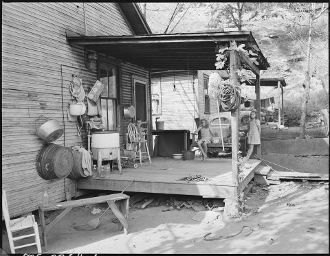 Front porch of home of Virgil Price, miner. They have lived here 12 years. Have 4 children, 2 beds, pay rent $10 per...…