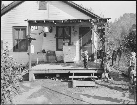 Front porch of home of Murray Price, miner. They have running water inside, have lived in this house 2 years (, it)... …