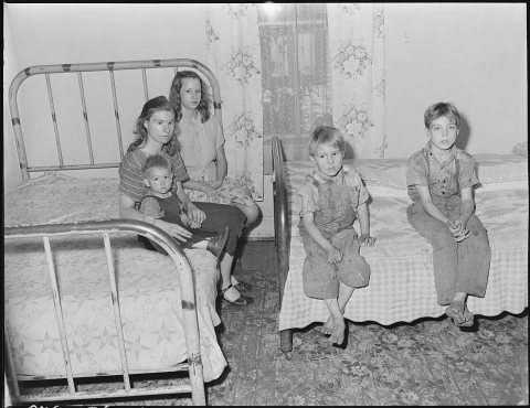 Bedroom in home of Murray Price, miner, six people sleep in these two beds. One larger boy is missing in picture. He...…