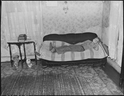Child of Murray Price, miner, asleep on couch where he normally sleeps at night. Black Mountain Corporation, 30-31... -…