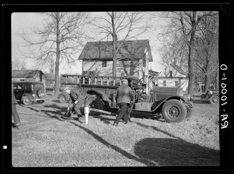 Smalltown volunteer fire department at work. Aledo, Illinois