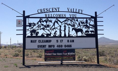 2014-05-31 13 56 25 Sign at the north entrance to Crescent Valley, Nevada along Nevada State Route 306-cropped