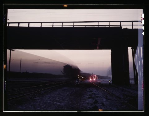 View in a departure yard at C & NW RR's [i.e. Chicago and North Western railroad's] Proviso (?) yard at twilight, Chica…