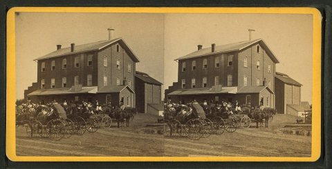 Large group of people in buggies and wagons at C.P. Chapman's flouring mill in Pittsfield