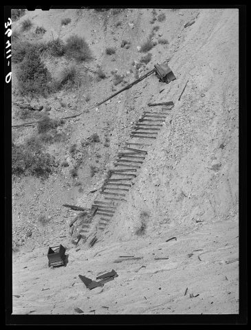 Old ore cars and ties of inclined railway at copper mine of Burro Mountain Copper Company. Tyrone, New Mexico