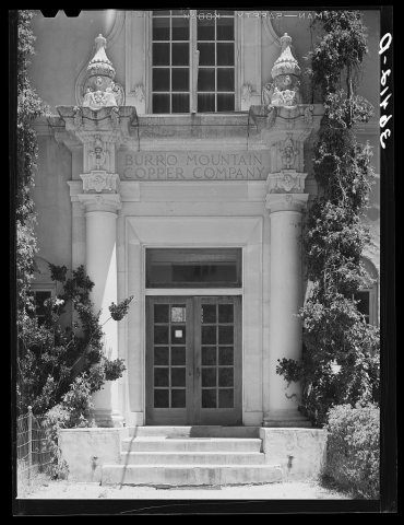 Entrance to offices of Burro Mountain Copper Company. Tyrone, New Mexico. This copper company is no longer actively eng…