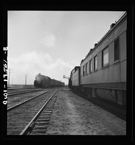 Untitled photo, possibly related to: Chillicothe, Illinois. Changing crews and cabooses of a westbound freight train al…